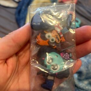 Inside out croc charms never opened!